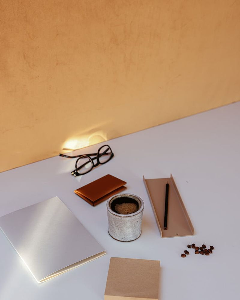 Abstract morning sunlight reflecting on office desk accessories